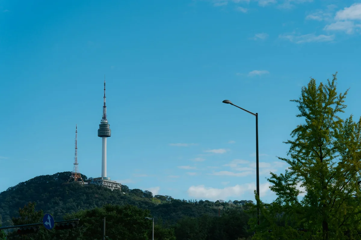 Namsan summit evening N Seoul Tower illuminated
